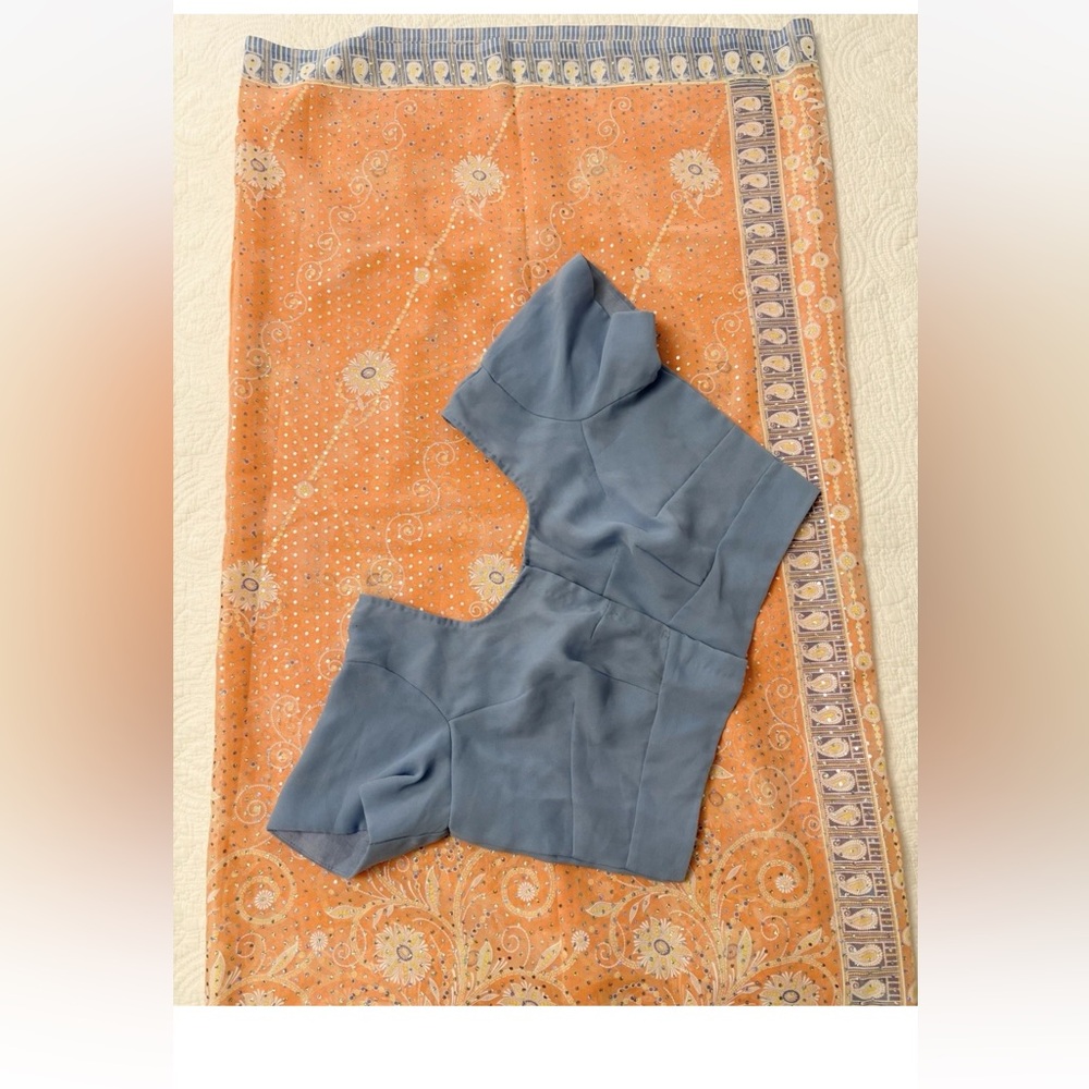 Indian Blue Blouse with Orange Peach Patterned Saree